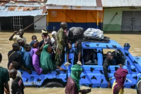 Residents wade through floodwaters in Maiduguri, northeast Nigeria, following heavy rainfall in September, 2024. Photo: Audu Marte/AFP via Getty Images