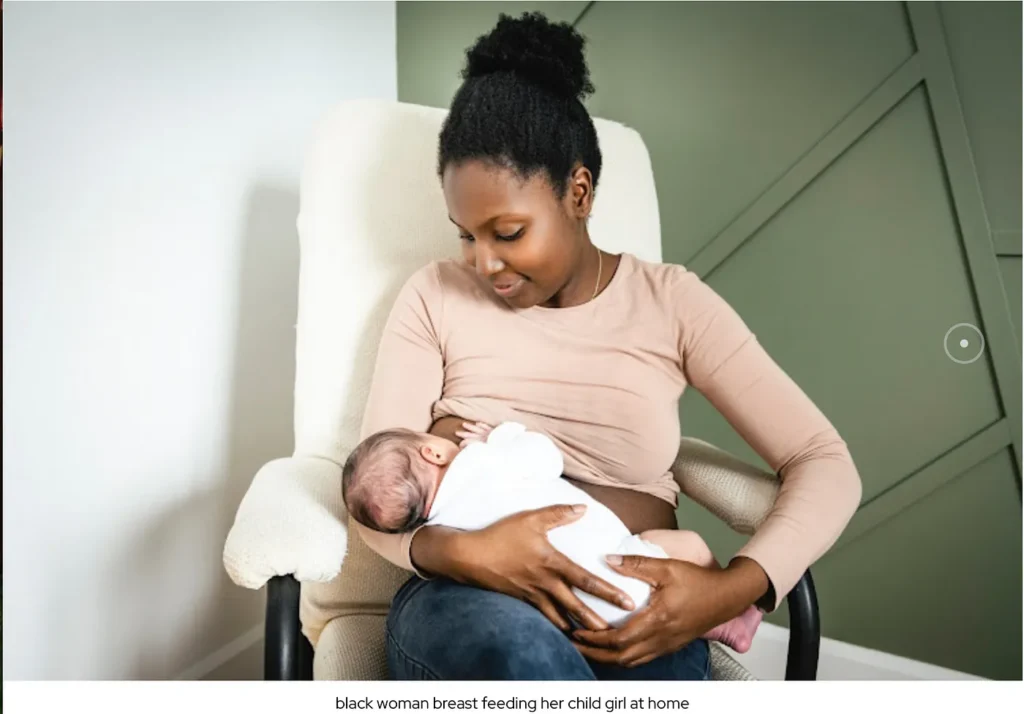 A woman breastfeeding her baby | women file photo