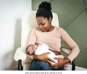 A woman breastfeeding her baby | women file photo