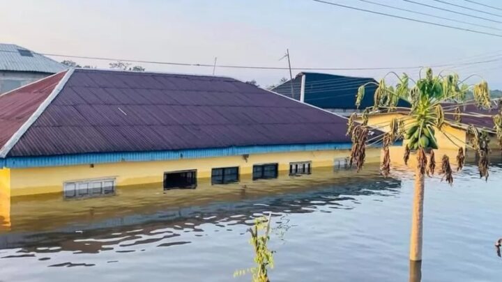 A file photo of a house submerged by flooding